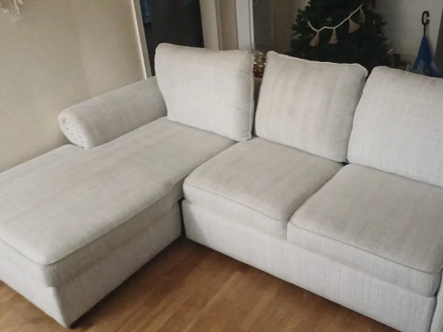 The same light sofa with chaise after cleaning, even light color on the chaise and seats