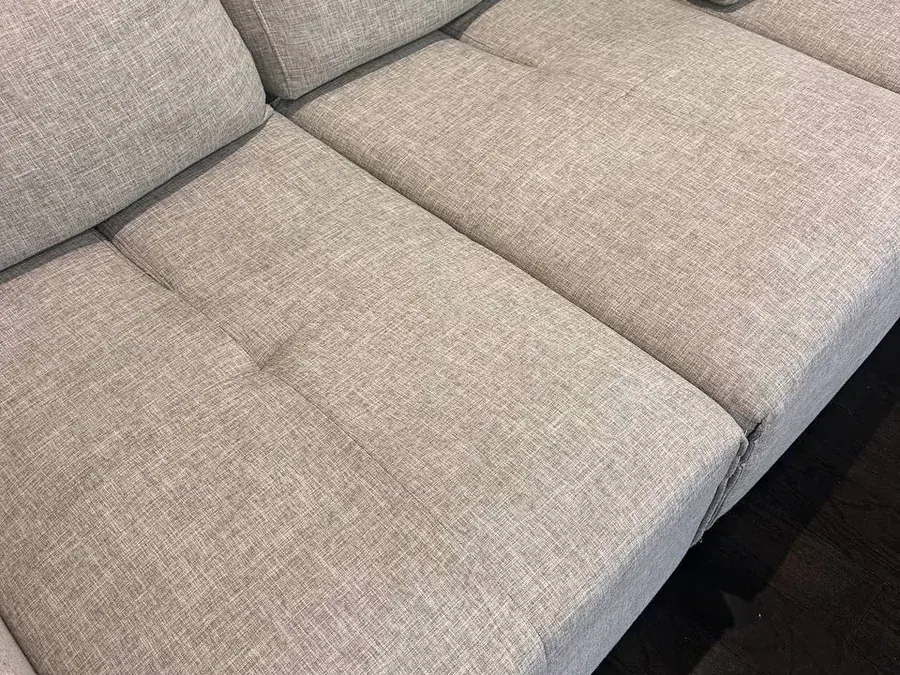 The same sectional seat cushions after upholstery cleaning, stains removed