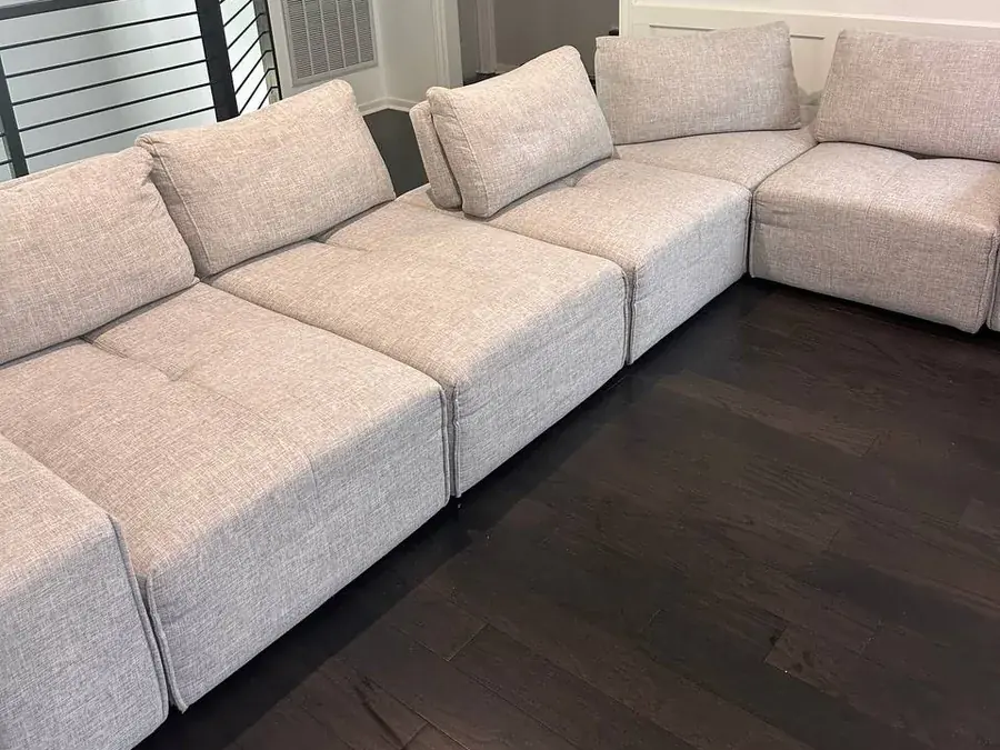 The same modular sectional after deep cleaning, stains removed