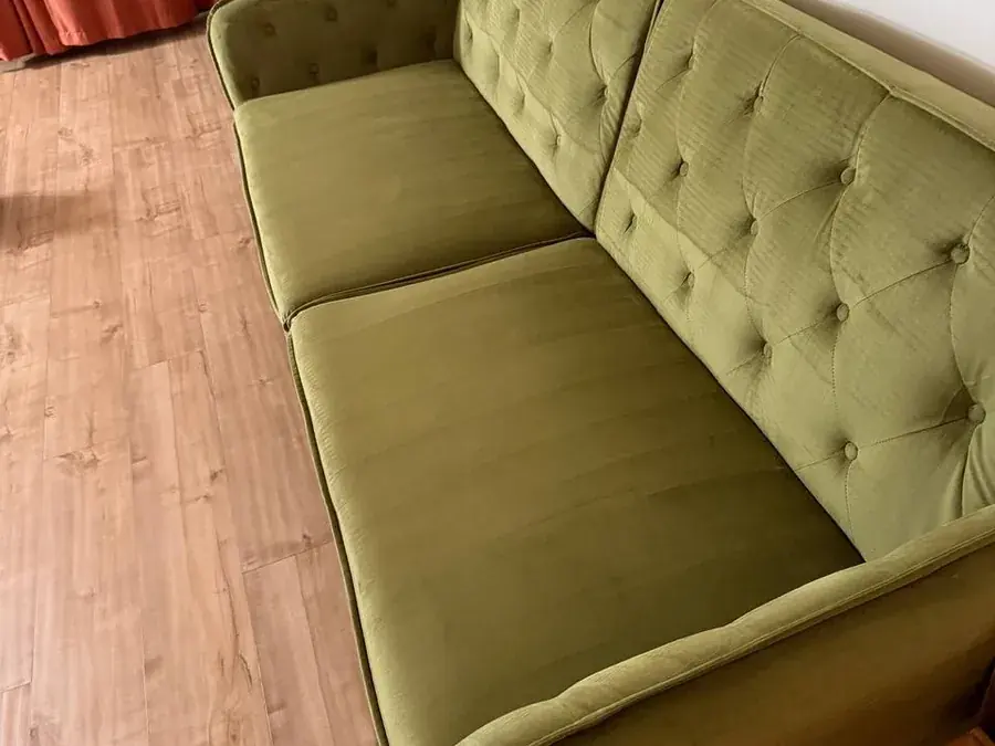 The same velvet sofa after upholstery cleaning